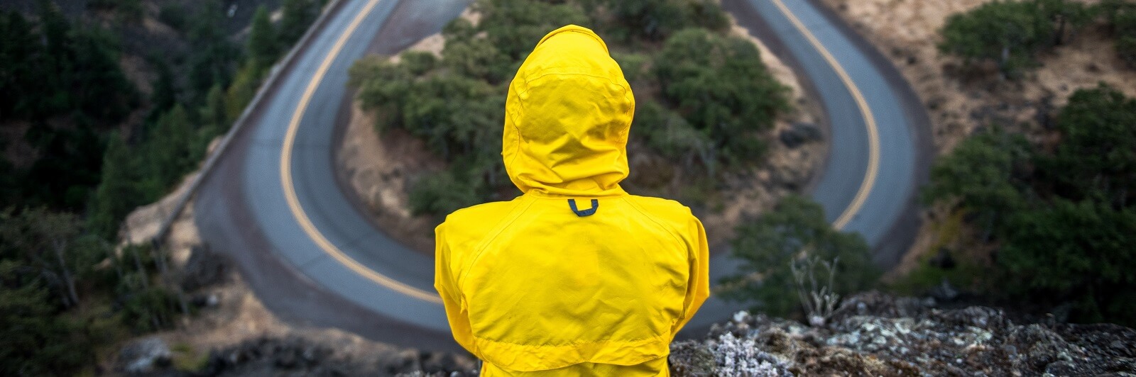 man looking at road